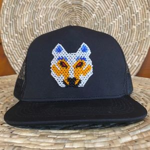Beaded Fox Snapback Hat

Huichol Beaded front logo